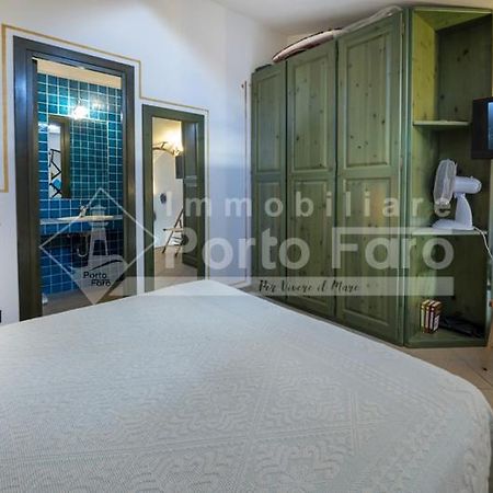 23 Baia Faro - Trilocale Mansardato Con Ampia Terrazza Vista Mare 帕劳 外观 照片