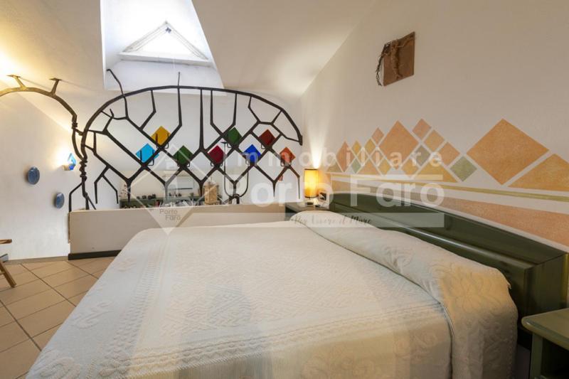 23 Baia Faro - Trilocale Mansardato Con Ampia Terrazza Vista Mare 帕劳 外观 照片